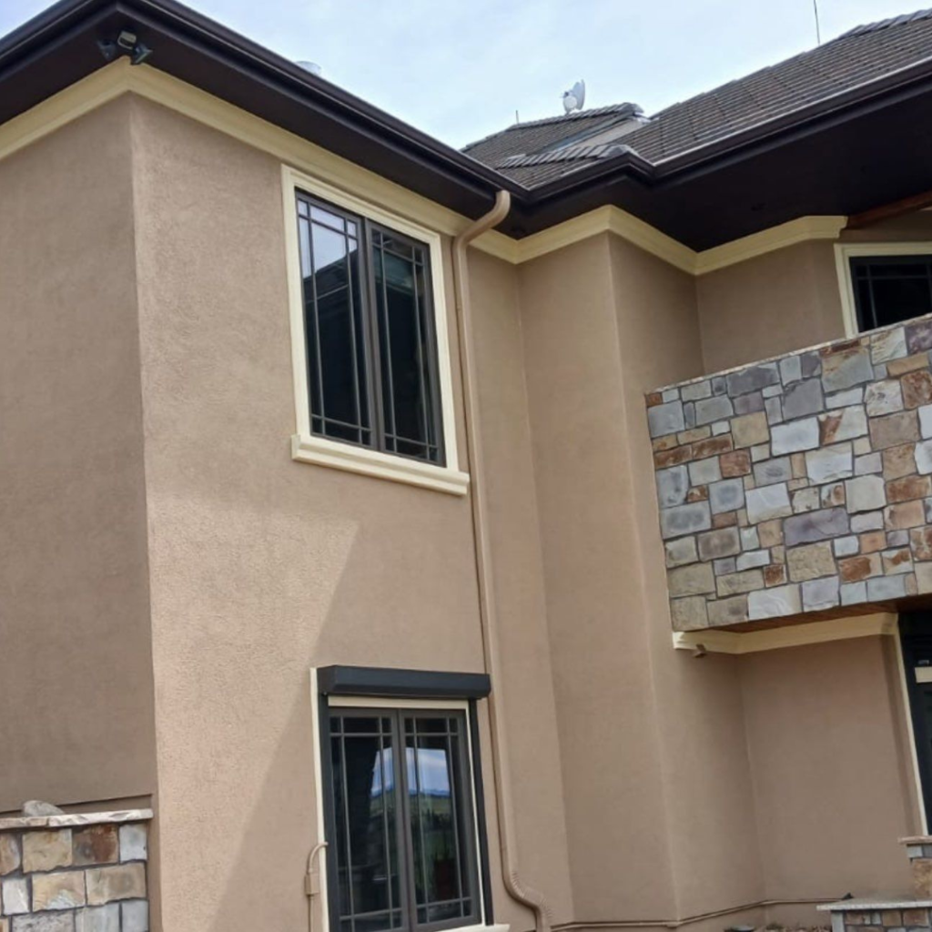 2 stucco and stone home transformation in castle rock, co